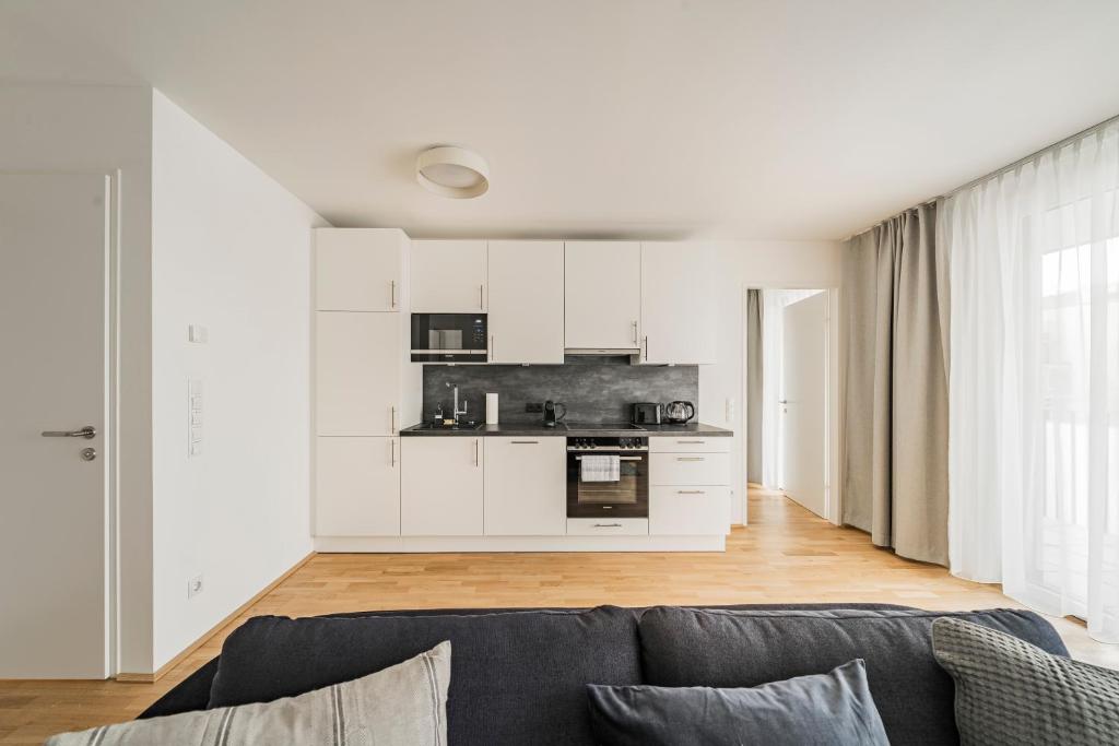 Kuchnia lub aneks kuchenny w obiekcie Arbio I Liv's Place Lux Apartments