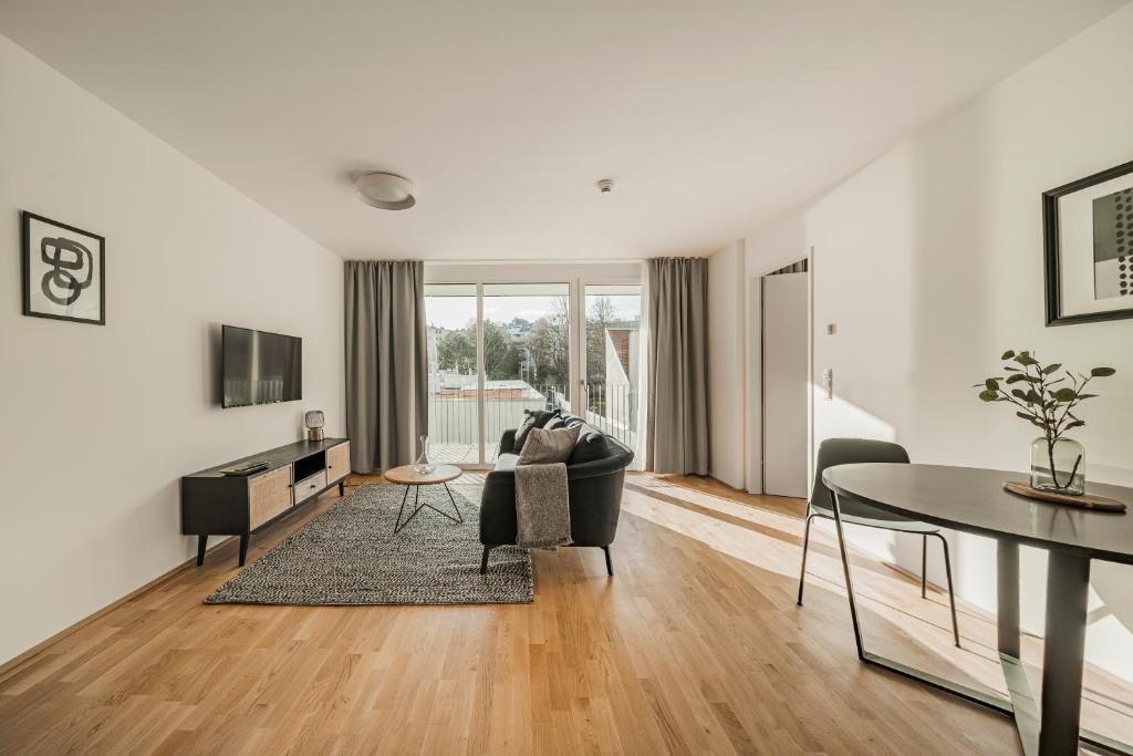 Telewizja i/lub zestaw kina domowego w obiekcie Arbio I Liv's Place Lux Apartments