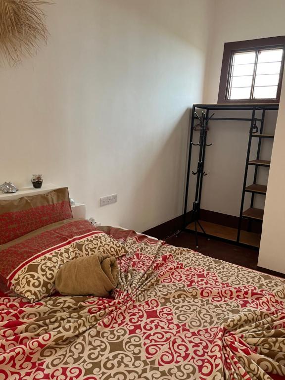 Postel nebo postele na pokoji v ubytování Habibi B&B