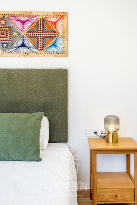 Postel nebo postele na pokoji v ubytování HigueronRentals Mimosa