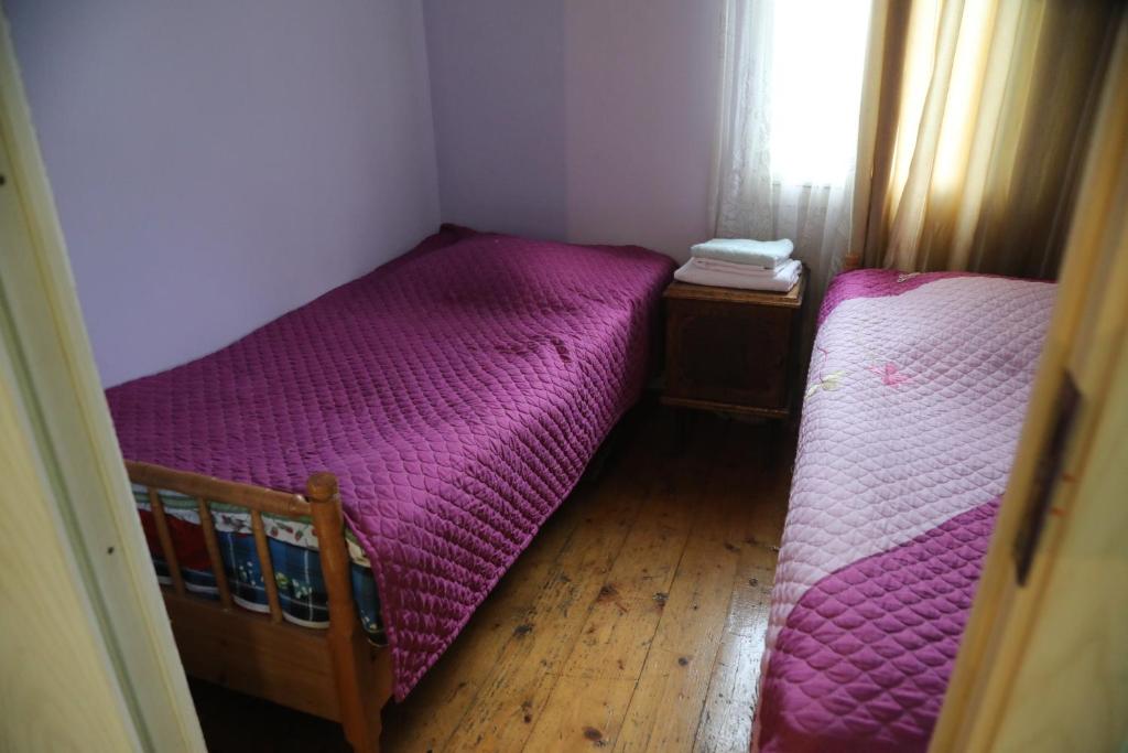 Postel nebo postele na pokoji v ubytování Guest House LALI