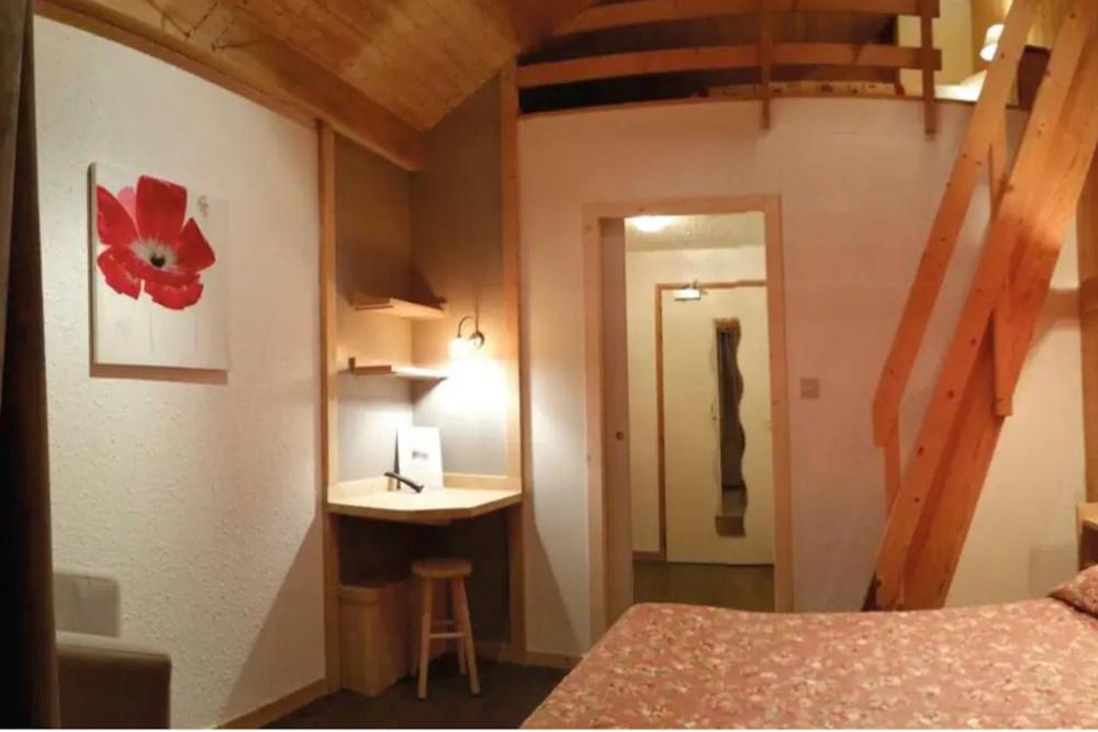 Postel nebo postele na pokoji v ubytování Hotel Les Lans