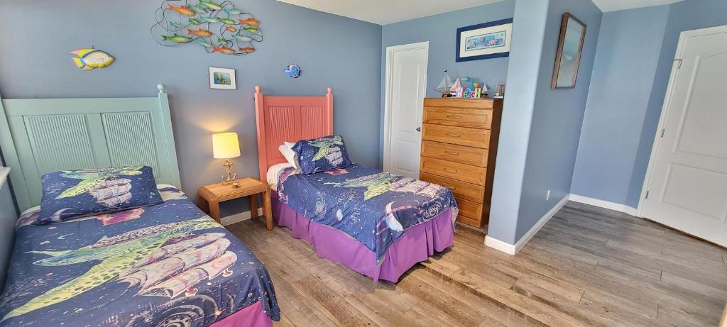 Llit o llits en una habitació de Inverness Penthouse