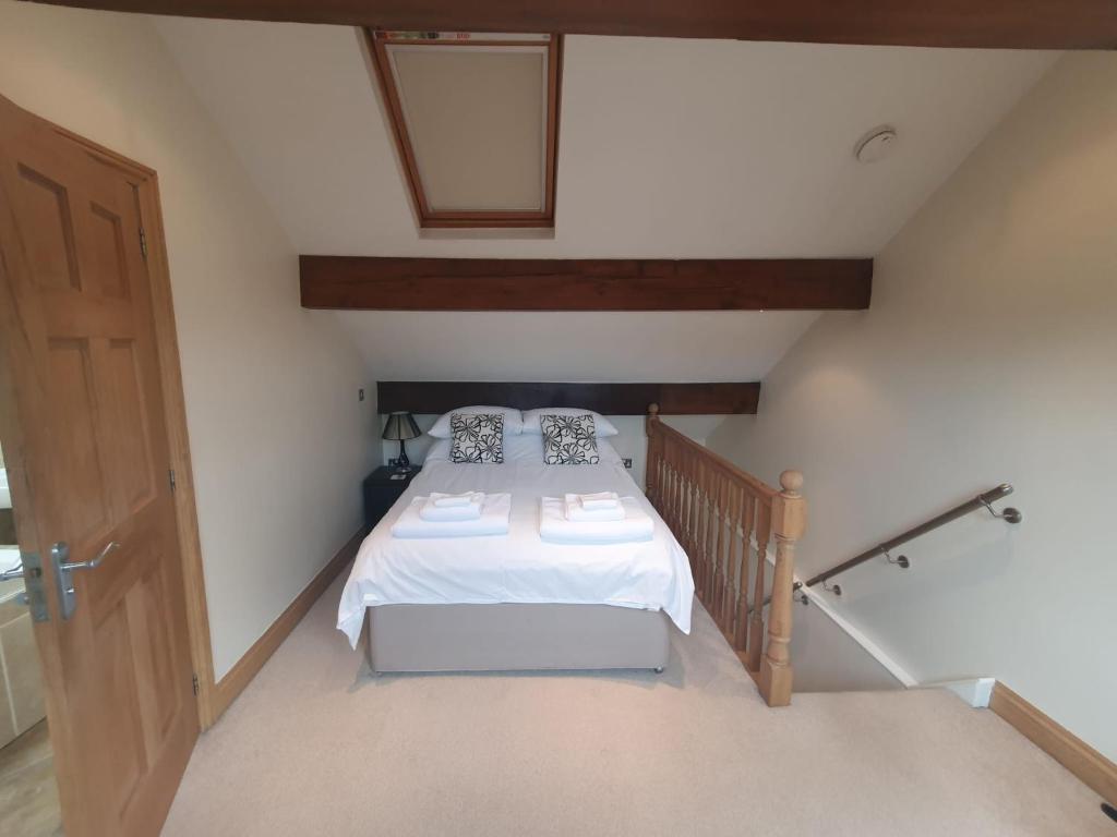 Кровать или кровати в номере St Annes