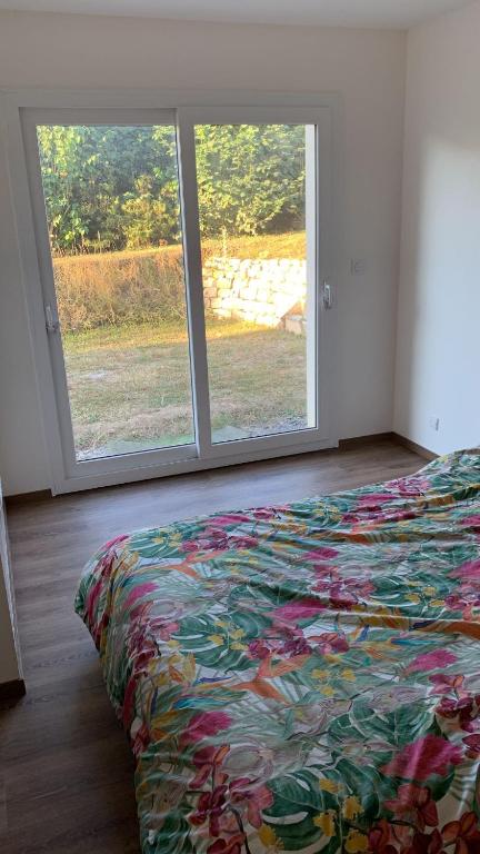 Postel nebo postele na pokoji v ubytování Belle suite parentale