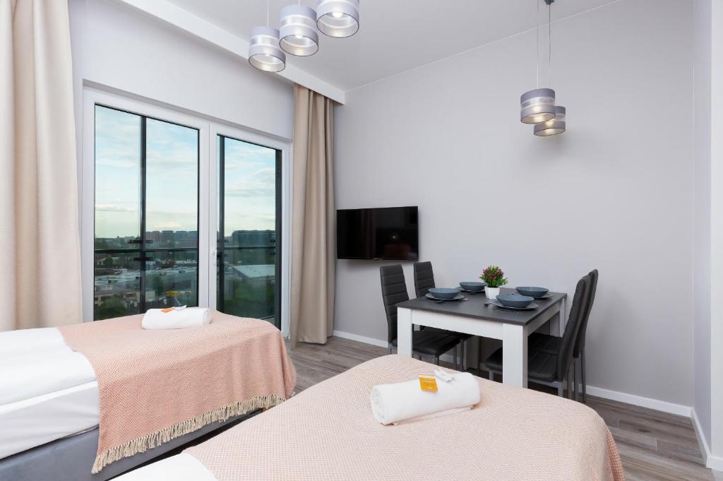 Posteľ alebo postele v izbe v ubytovaní Warsaw Prymasa Tysiąclecia Business Centre by Noclegi Renters