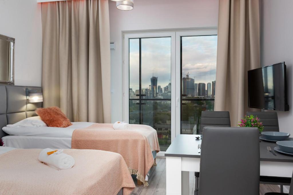 Posteľ alebo postele v izbe v ubytovaní Warsaw Prymasa Tysiąclecia Business Centre by Noclegi Renters