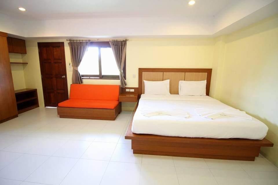 Postel nebo postele na pokoji v ubytování Rak Samui Residence