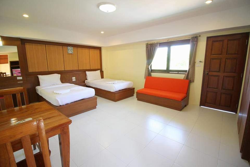 Postel nebo postele na pokoji v ubytování Rak Samui Residence