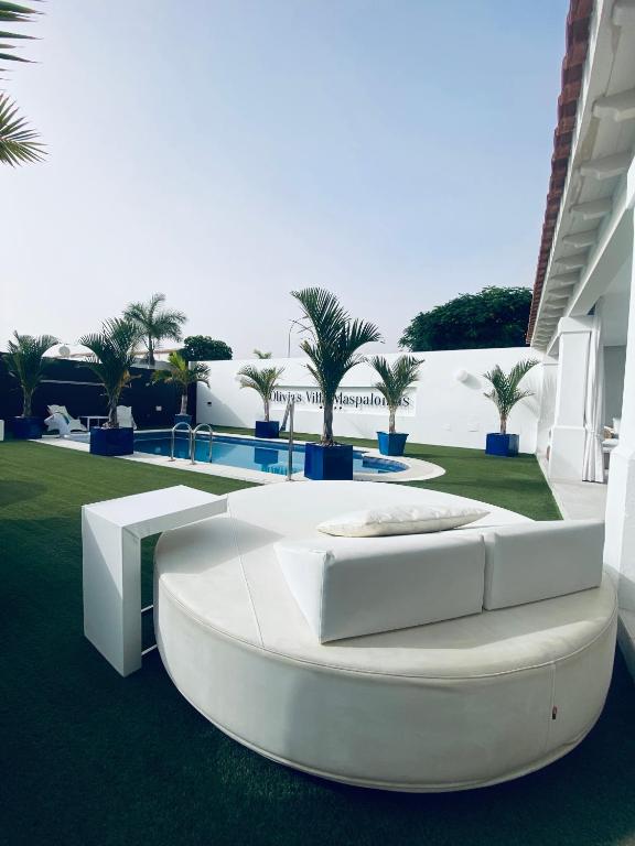 Bazén v ubytování Olivia Holidayhouse Maspalomas nebo v jeho okolí