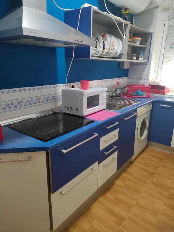 Kuchyňa alebo kuchynka v ubytovaní APARTAMENTO LIBERTY