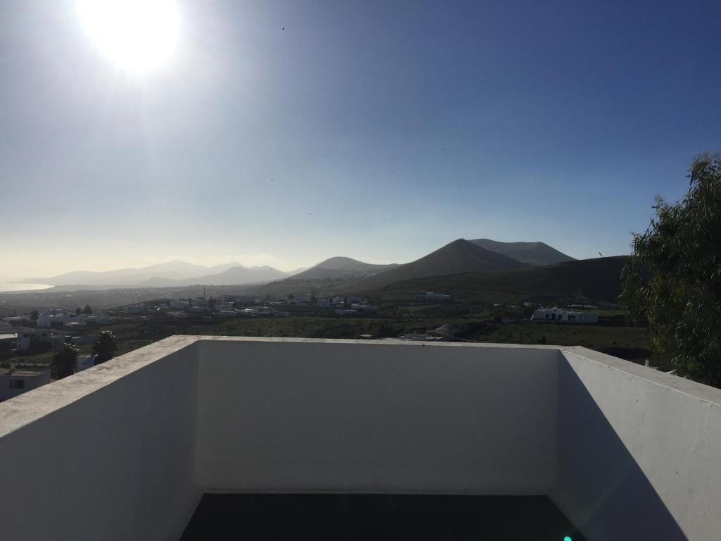 a view of the mountains from the roof of a house at El Olivo Beautiful Rural location 3 bed villa in Conil