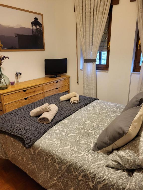Postel nebo postele na pokoji v ubytování Villa Sabina "Vivienda de Uso Turístico"