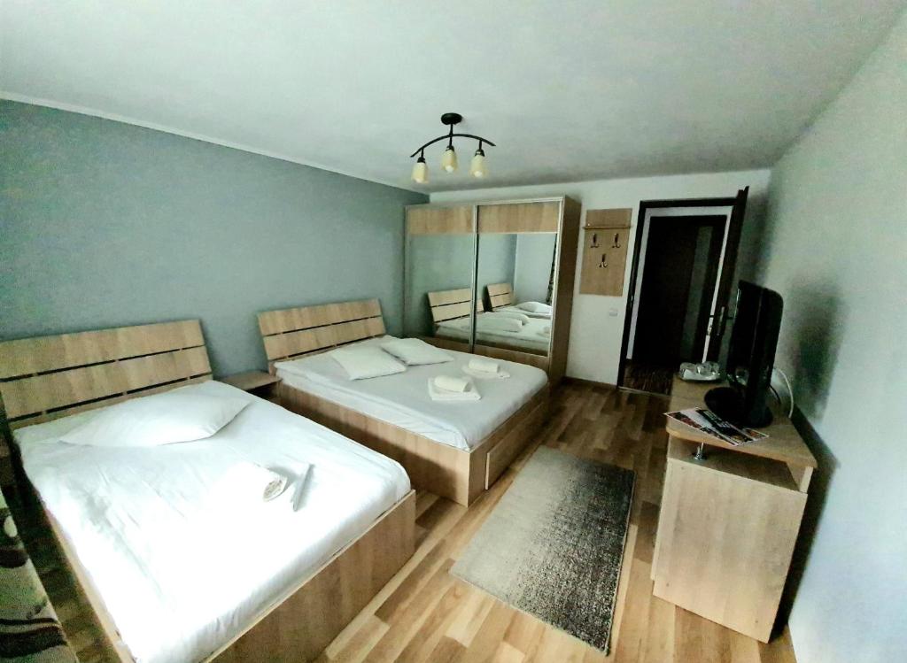 Postel nebo postele na pokoji v ubytování Casa Ostrov