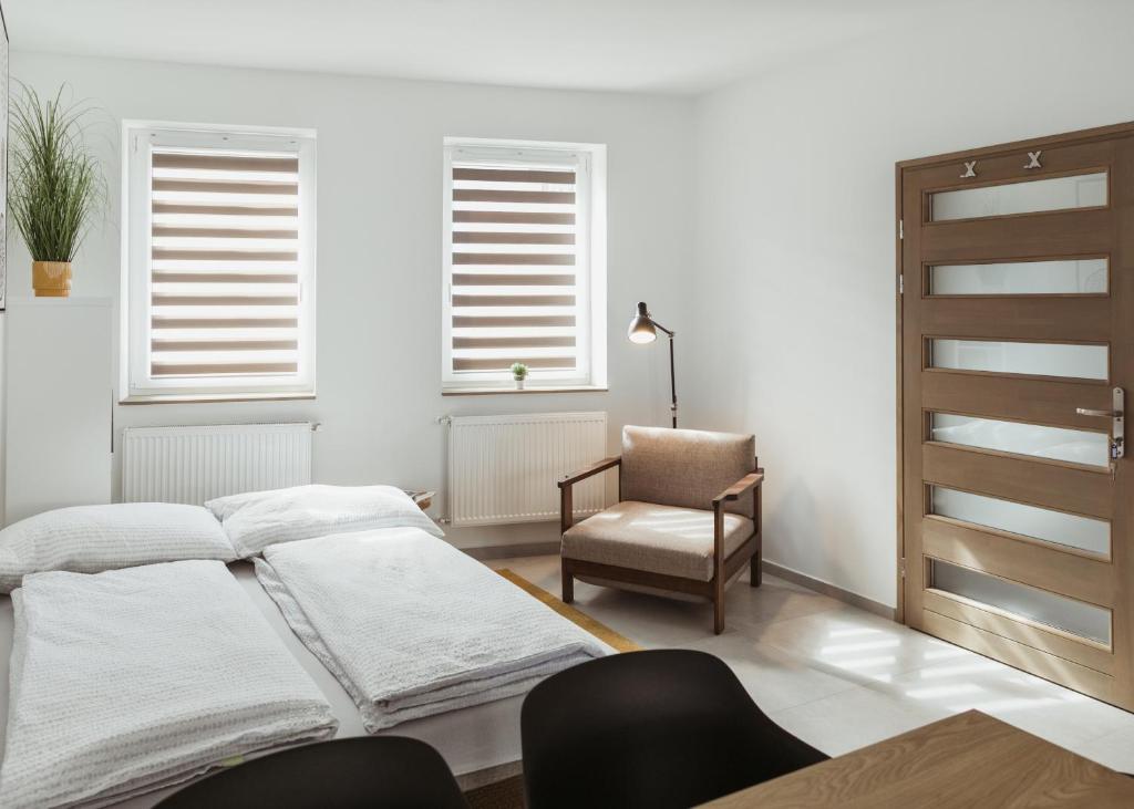 Postel nebo postele na pokoji v ubytování Major11 apartman - Zsolnay negyed