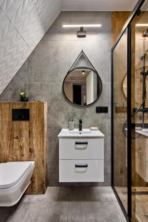 Kúpeľňa v ubytovaní REZYDENCJA SKIBÓWKI sauna&jacuzzi