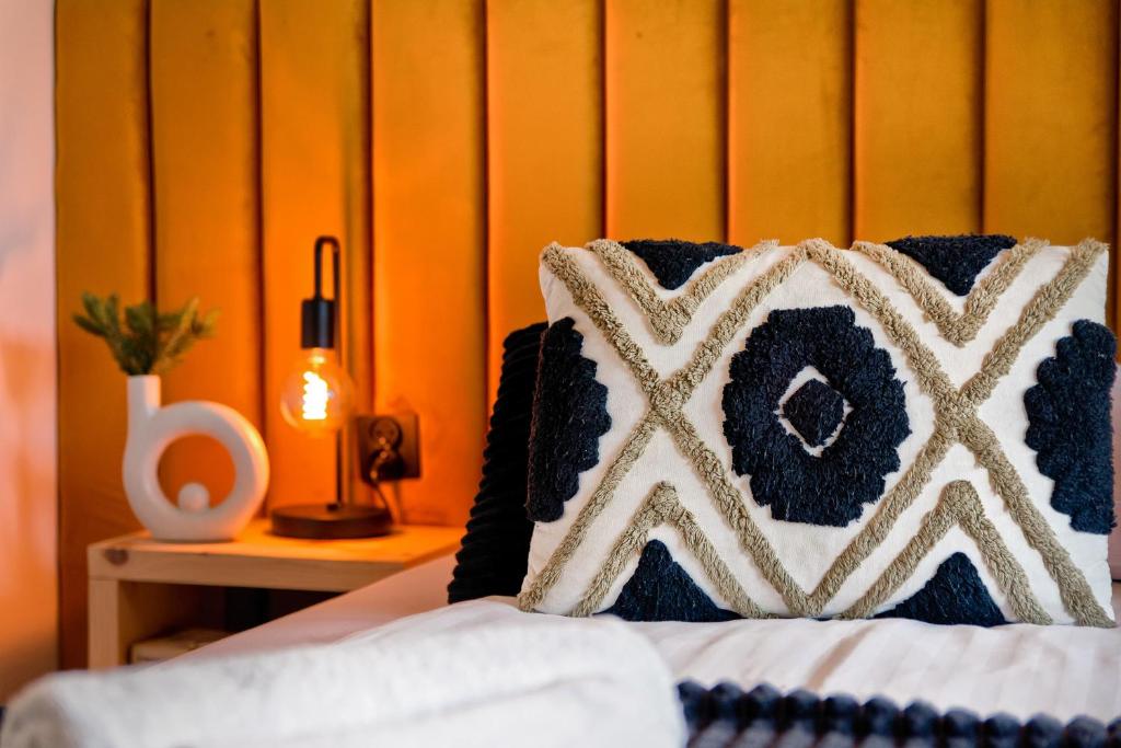 Posteľ alebo postele v izbe v ubytovaní REZYDENCJA SKIBÓWKI sauna&jacuzzi