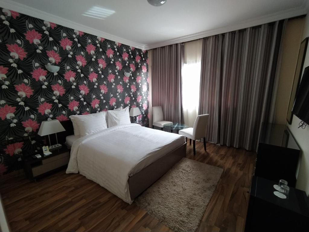 En eller flere senge i et værelse på Helnan Chellah Hotel