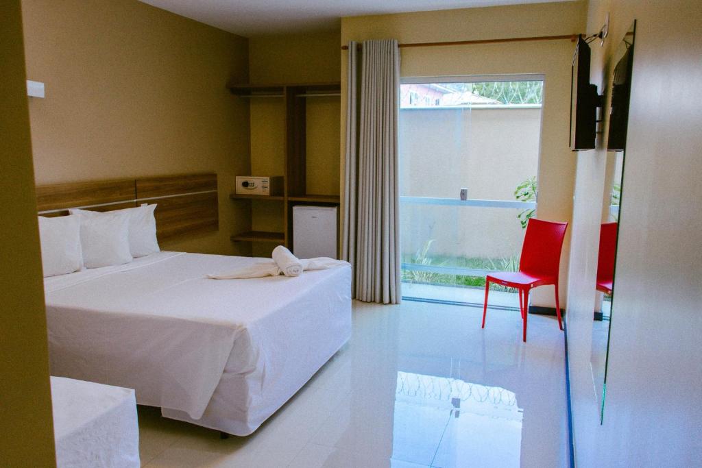 Postel nebo postele na pokoji v ubytování Pontal Praia Hotel