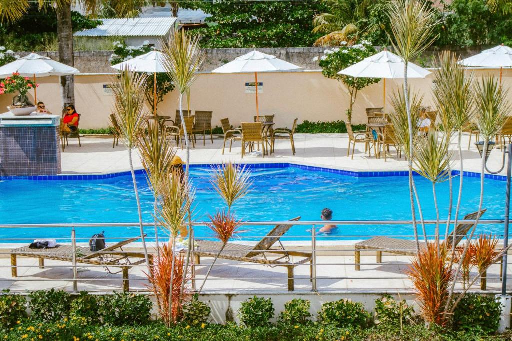 Bazén v ubytování Pontal Praia Hotel nebo v jeho okolí