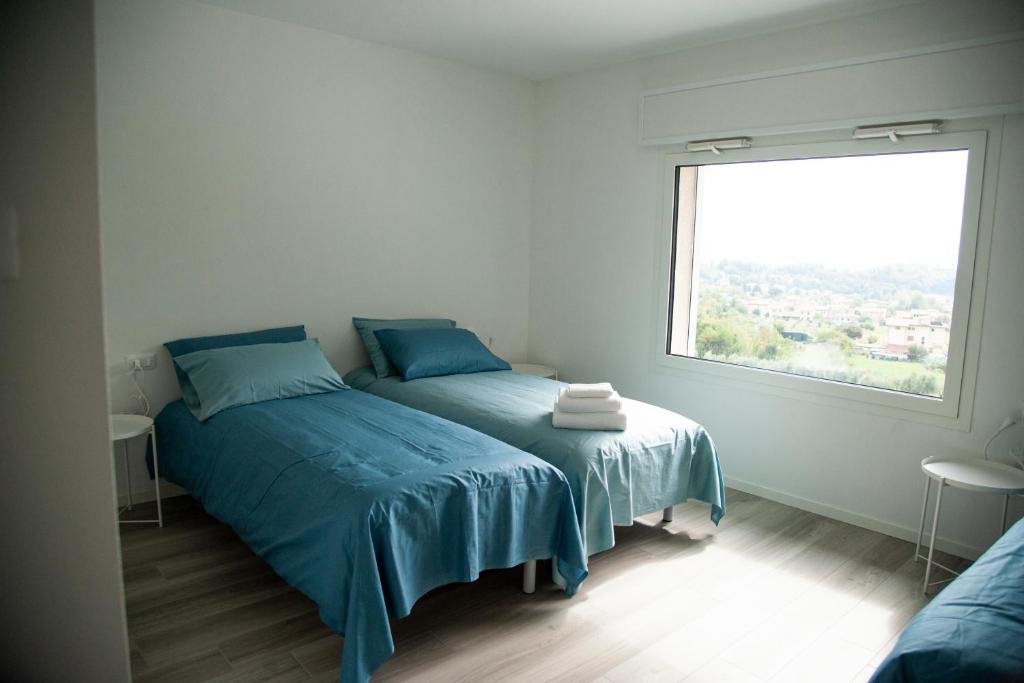 Postel nebo postele na pokoji v ubytování Casa Vittoria Guest House