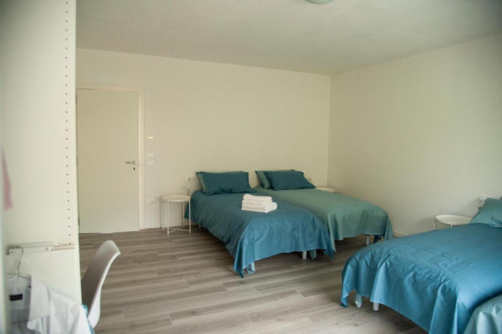 Postel nebo postele na pokoji v ubytování Casa Vittoria Guest House