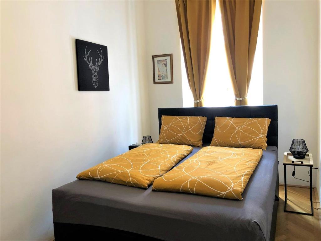 Posteľ alebo postele v izbe v ubytovaní MSQ Belvedere