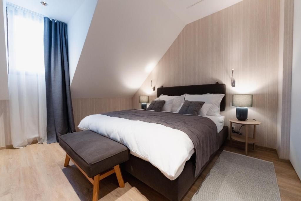 Postel nebo postele na pokoji v ubytování Vila De Casa