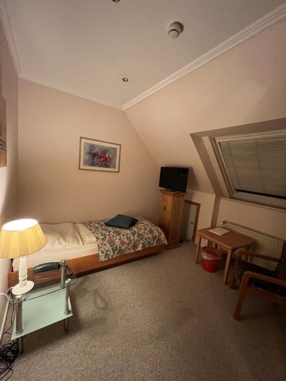 Hotel Exquisit - Pequeña Habitación Individual