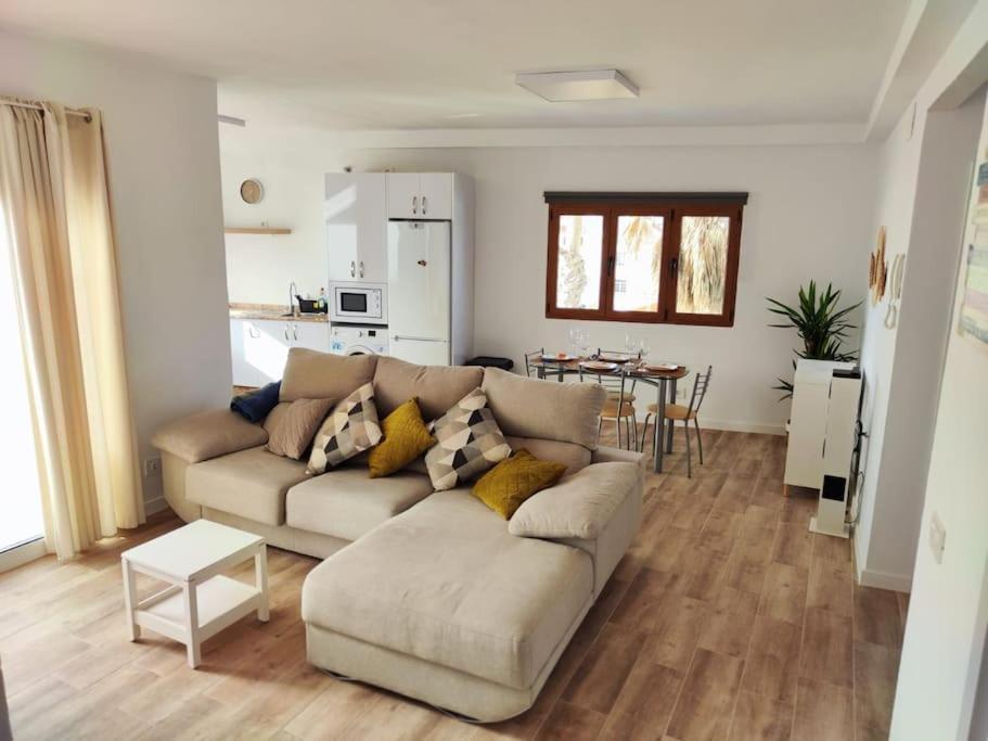 a living room with a couch and a table at Apartamento Villa Alpispa in Agüimes