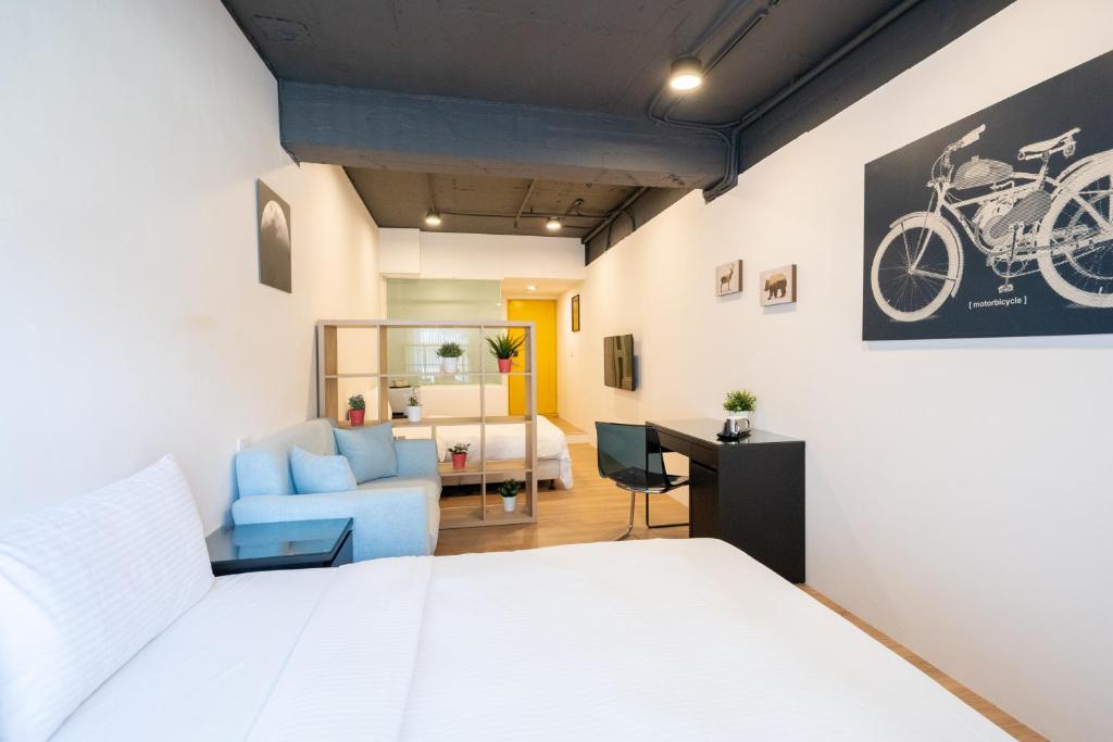 Postel nebo postele na pokoji v ubytování HotelsHere - Ximen