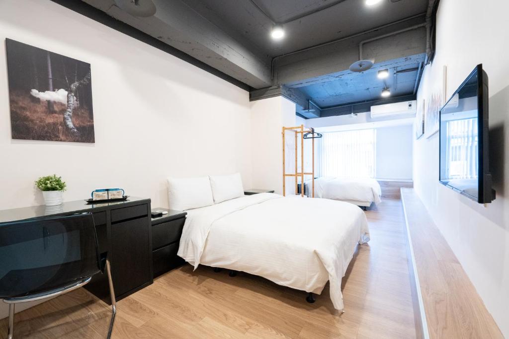 TV a/nebo společenská místnost v ubytování HotelsHere - Ximen
