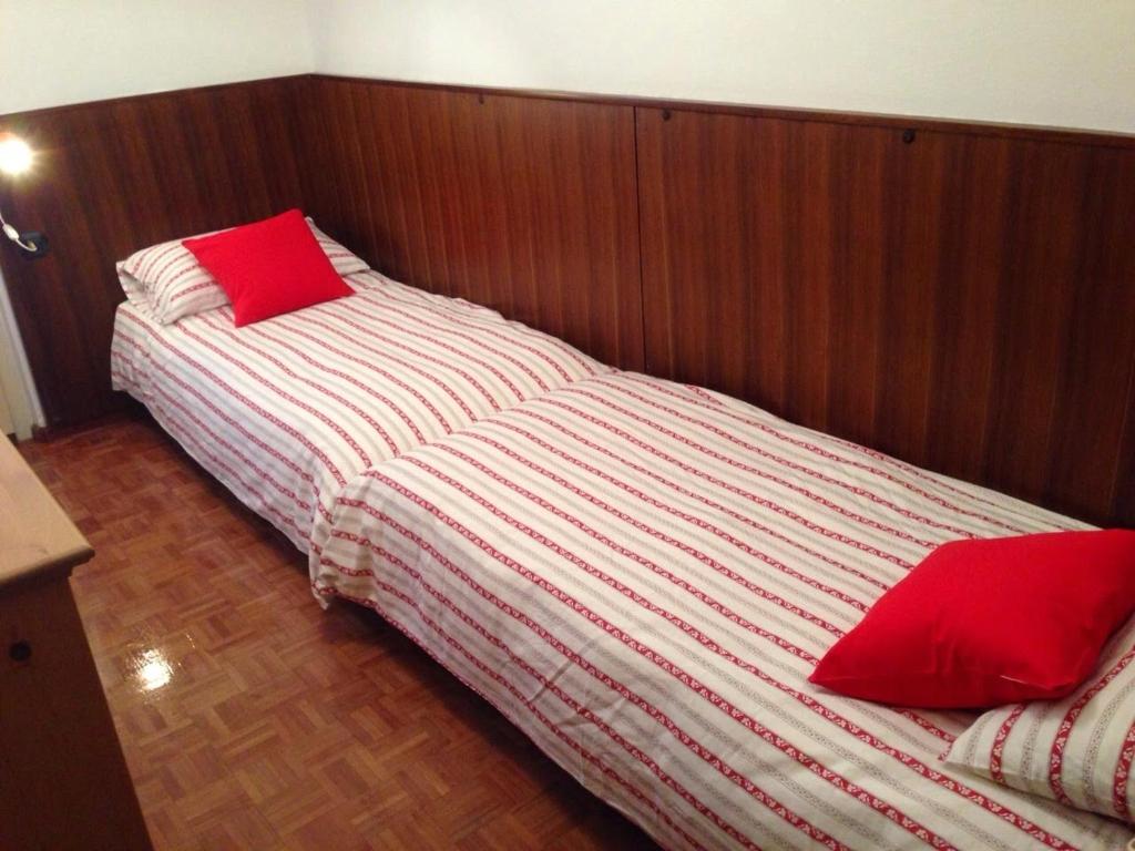Postel nebo postele na pokoji v ubytování Casa ai Dossi
