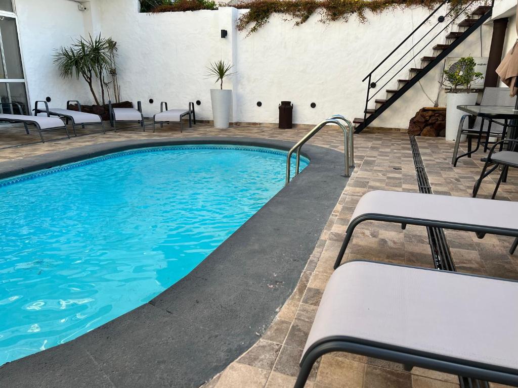 Bazén v ubytování Hotel Lujan nebo v jeho okolí