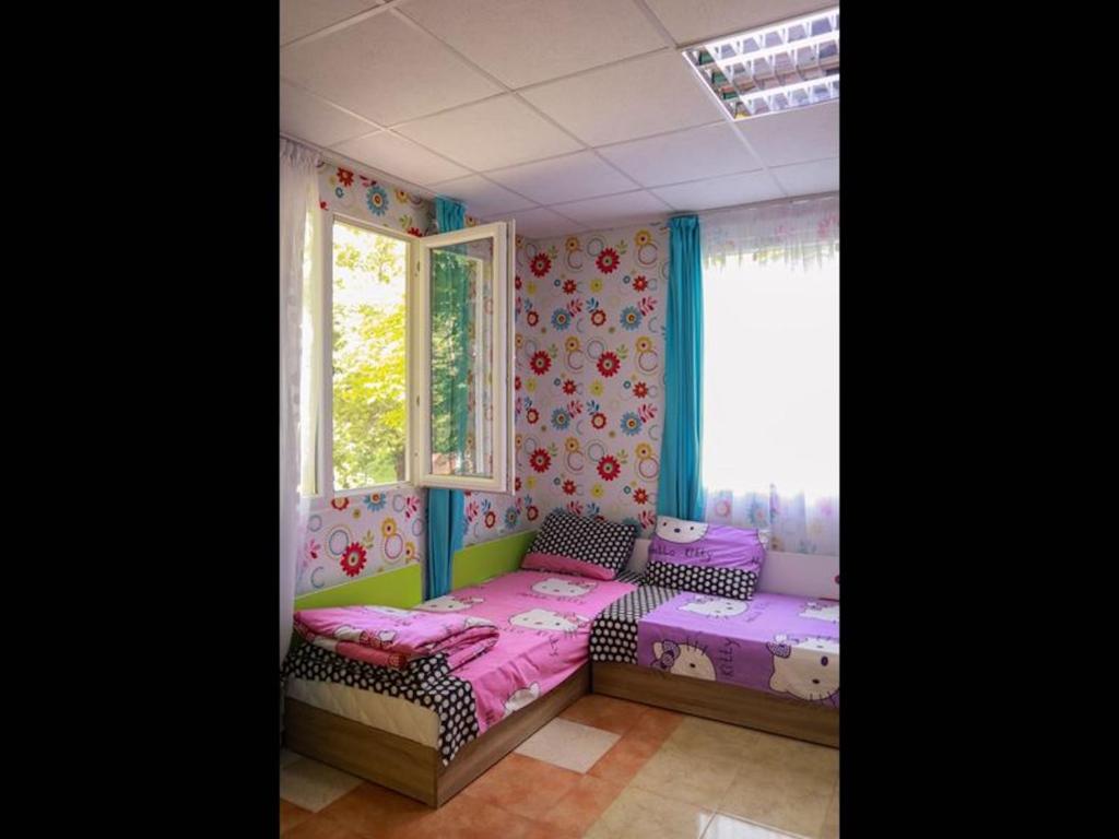 23 persons Bungalow in nice complex for familyにあるベッド
