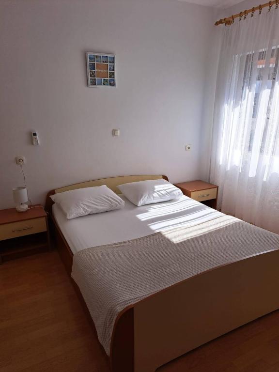 Postel nebo postele na pokoji v ubytování Apartments and rooms with parking space Metajna, Pag - 4120