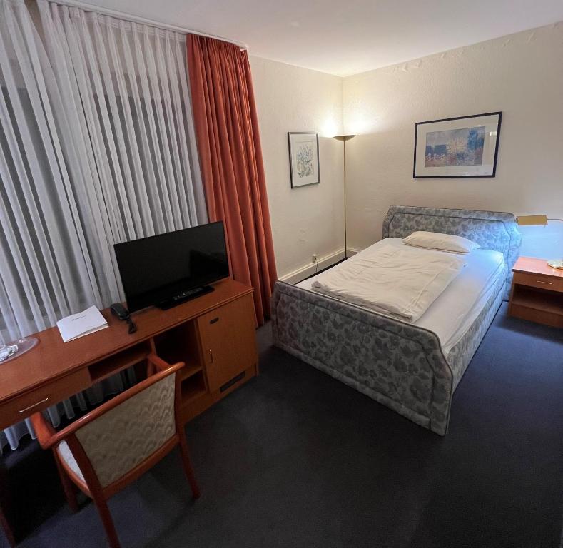 Hotel Exquisit - Habitación Triple Económica