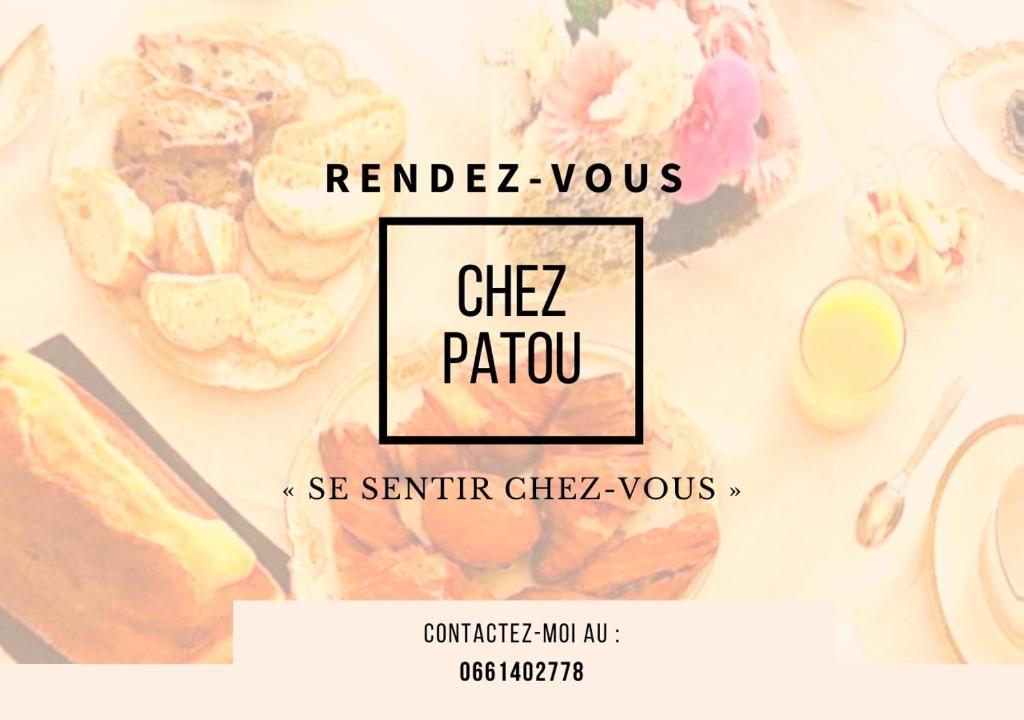 Chez Patou في لافال: صورة بعض الطعام على طاولة