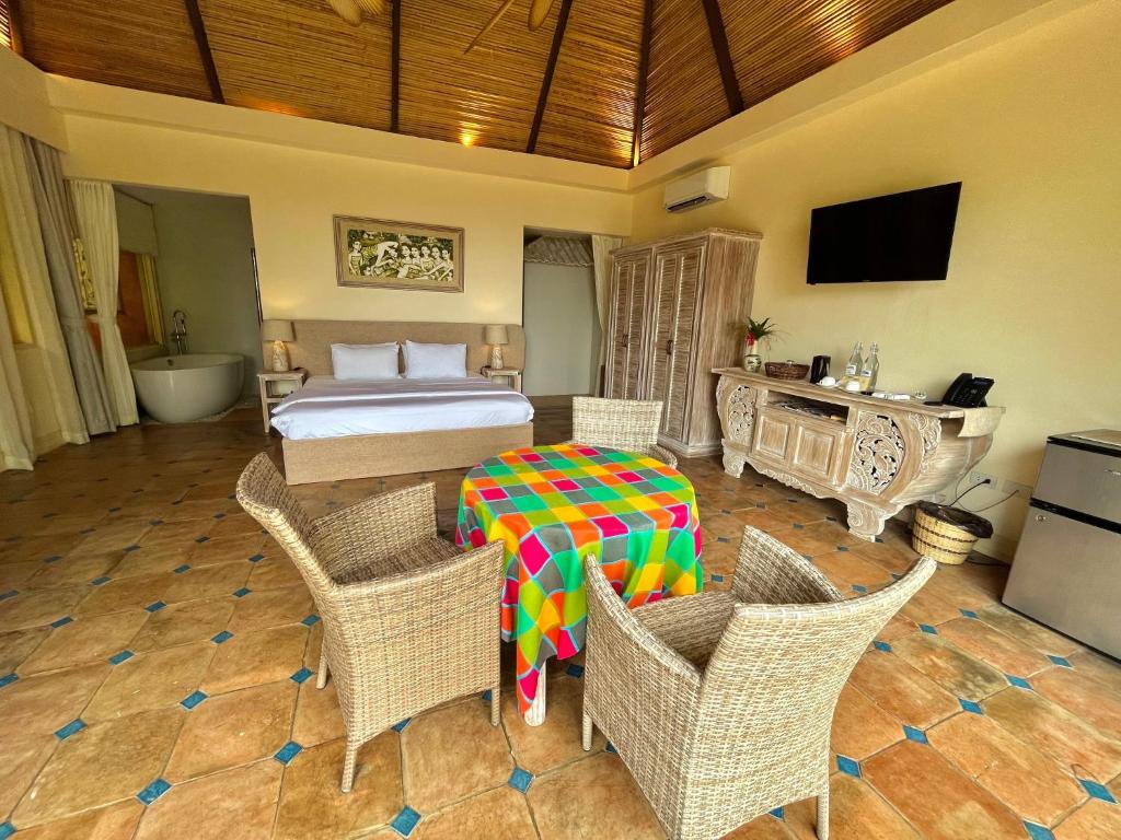 TV o dispositivi per l'intrattenimento presso Coco Grove Beach Resort, Siquijor Island