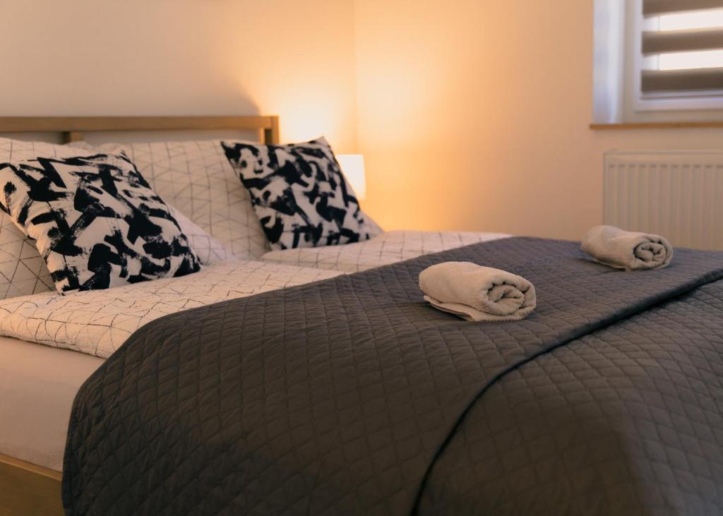 Postel nebo postele na pokoji v ubytování Major11 apartman - Zsolnay negyed