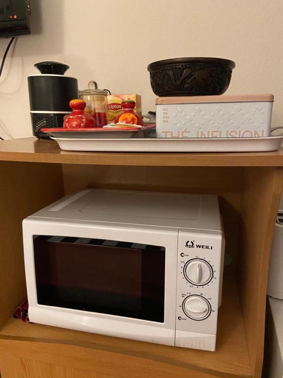 Kuchyň nebo kuchyňský kout v ubytování Happyhome