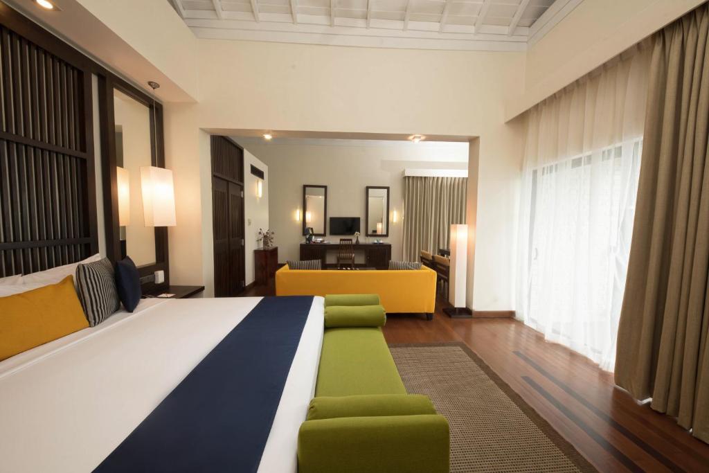 Postel nebo postele na pokoji v ubytování Club Hotel Dolphin