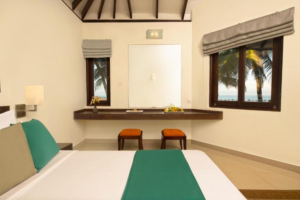 Postel nebo postele na pokoji v ubytování Club Hotel Dolphin