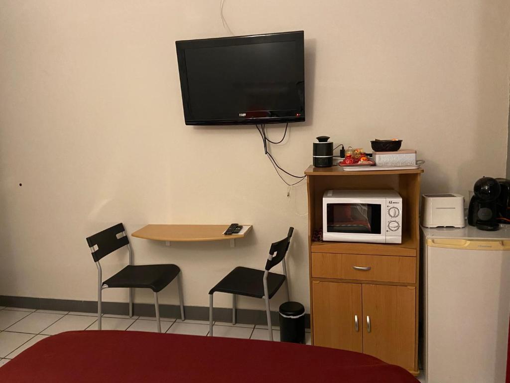 Kuchyň nebo kuchyňský kout v ubytování Happyhome