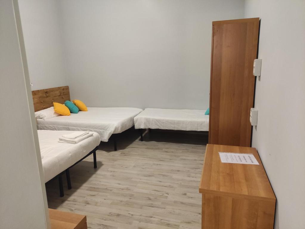 Postel nebo postele na pokoji v ubytování Hotel Big Bang