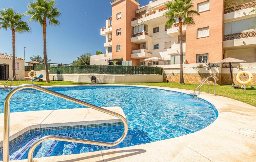 Bazén v ubytovaní Nice Apartment In Benalmádena With Wifi alebo v jeho blízkosti