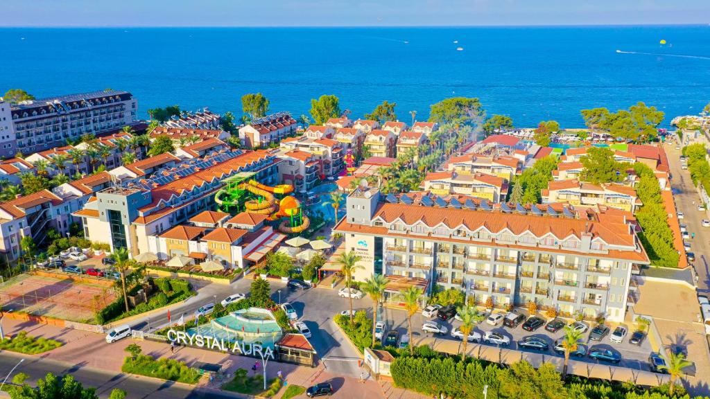an aerial view of a resort near the ocean at Crystal Aura Beach Resort & Spa - Ultimate All Inclusive in Kemer