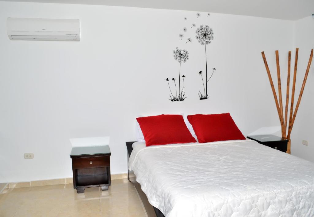 Postel nebo postele na pokoji v ubytování Hotel D' Leon Inn