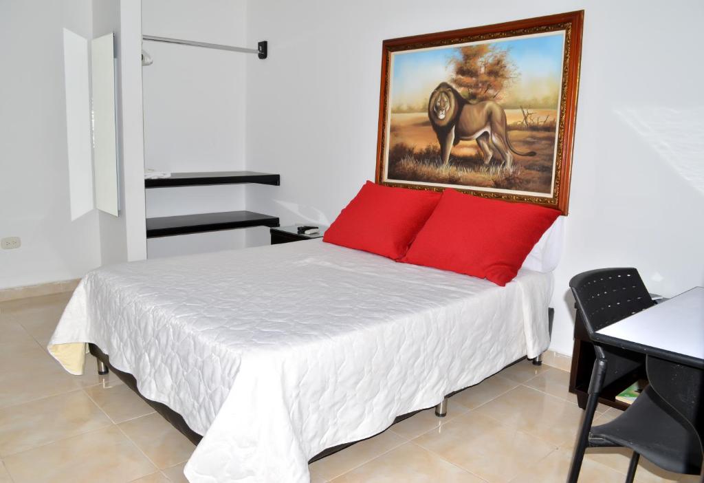 Postel nebo postele na pokoji v ubytování Hotel D' Leon Inn