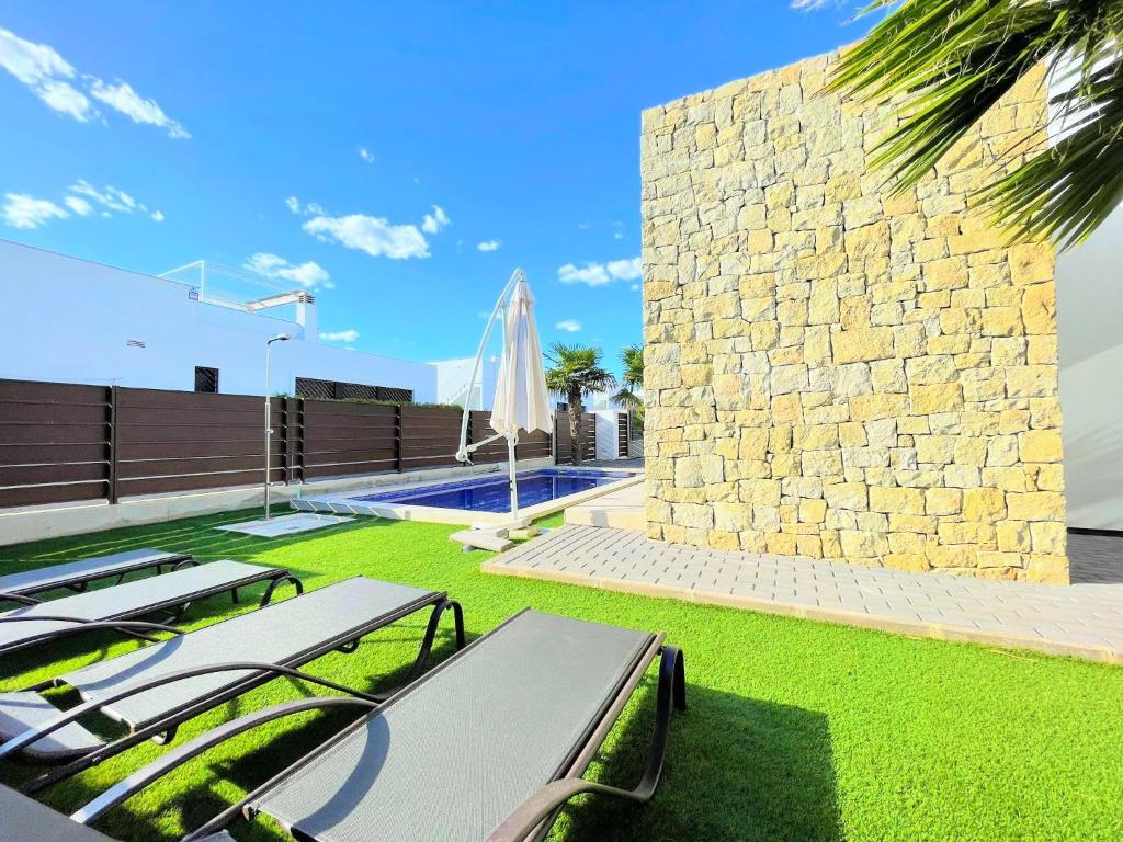 Fotografie z fotogalerie ubytování Villa Vistabella Golf Resort by Villas&You v destinaci Orihuela Costa